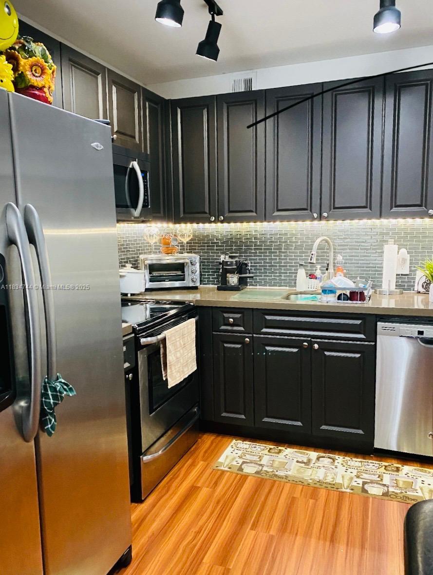 PRICED TO SELL! 55+ community with LOTS OF AMENITIES! 2 bedroom 1.5 bath on 2nd Floor in Kingsley 213D. Each unit in this building has CENTRAL AC. This apartment has a BEAUTIFUL VIEW OF THE CANAL & GOLF, it has Laminated floors throughout that need some TLC but the kitchen is REMODELED with GRANITE COUNTER TOPS, SHUTTERS, TANKLESS WATER HEATER from 2016. Additional features include:
- AC unit is 5 years old
- New AC ELECTRICAL BOX
- Washer/Dryer on 2nd floor near ELEVATOR
- Storage and mail room on 2nd floor
- Maintenance fees include water, trash, sewer, basic cable, and internet
- CVP $271.76 monthly and Landmark $477.21 monthly
- Parking Space #213D
- NO RENTALS for 2 years and 15% Cap thereafter.