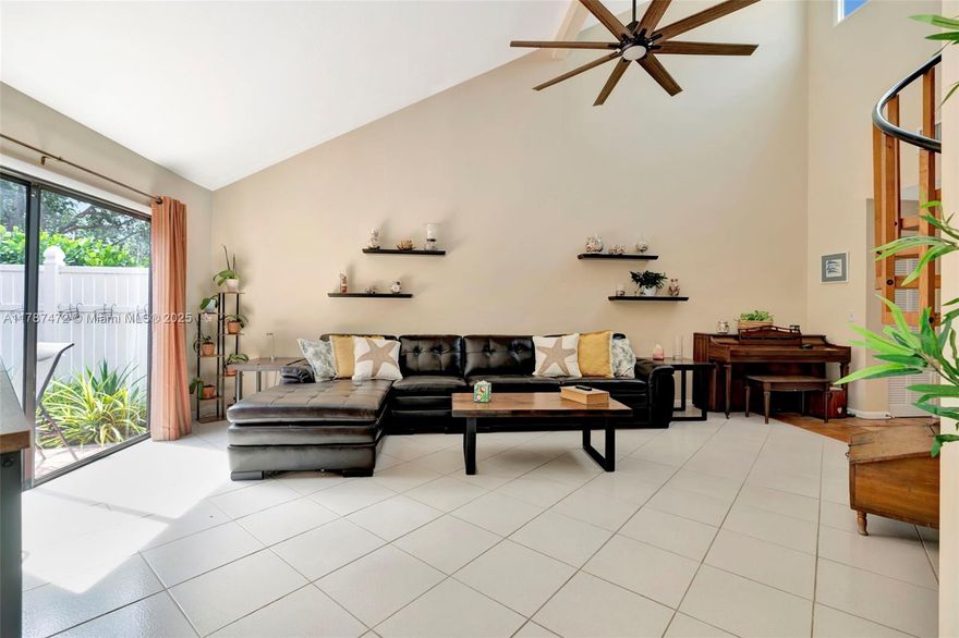 Exceptional  value in Greens Cay, priced to sell. Spacious 2/2.5 /2, high vaulted ceilings and tons of natural light, an elegant wood burning stone fireplace in the living room and a wet bar, formal dinning room, and a spiral staircase leading to a oversized second-floor loft that can be enclosed and has storage, eat-in kitchen with pantry and stainless steel appliances, there are  two beautifully landscaped patios for outdoor entertainment and grilling , master bedroom is large and on the ground floor with walk in closet , second bedroom is a suite by itself with a private bath and remodeled shower. Two car garage and plenty of guest parking spaces. Upgrades include tile roof 2021, impact windows 2024, AC 2018. 24 hour manned gate. Close to all shops, restaurants, Hospital and  airport.