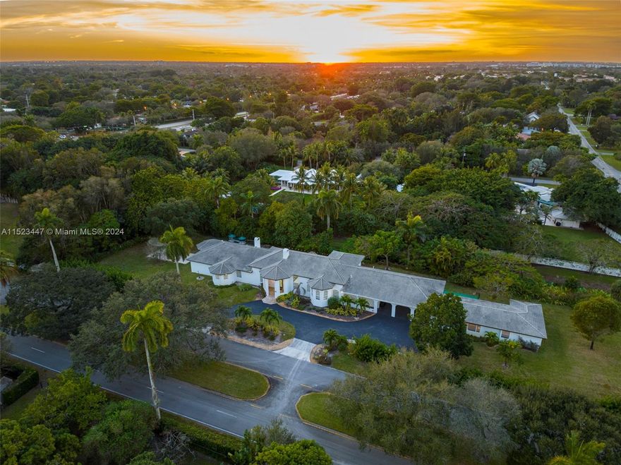 HISTORIC PLANTATION Custom Built in 2004 with double volume ceilings, 3 fireplaces, full acre lush tropical private lot. Enjoy 10 bedrooms and 6 full baths with an open floor plan. Extremely spacious covered carport, over-sized covered patio with travertine, amazing heated pool with attached whirlpool. Large kitchen with full wall pantry, stainless gas burner stove and hood. 1000 gallon propane tank, sprinkler system, generator hook-up already wired throughout entire home, high impact windows and French doors, incredibly large walk-in closets with built-ins.