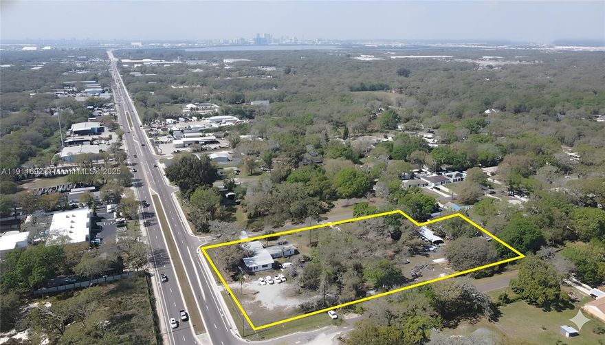 Rare 2.84-acre PD-zoned site at 6802 Causeway Blvd, Tampa, FL, with 3 parcels (16 lots) and ±250 ft frontage. Flexible zoning allows commercial, light industrial, IOS, or residential redevelopment. Level, cleared site with public water (septic required) and existing 3,993 SF structure. Heavy traffic exposure (21,000 VPD) and prime location near I-75, US-301, Selmon Expressway, and Port of Tampa. Opportunity Zone benefits add strong investment potential.