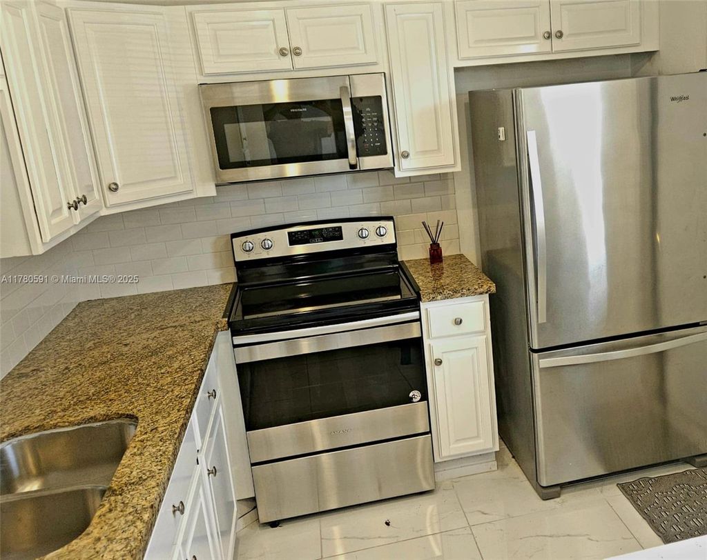 Photo of 218 NE 12th Ave #107, Hallandale Beach, FL 33009 (MLS # A11780591)