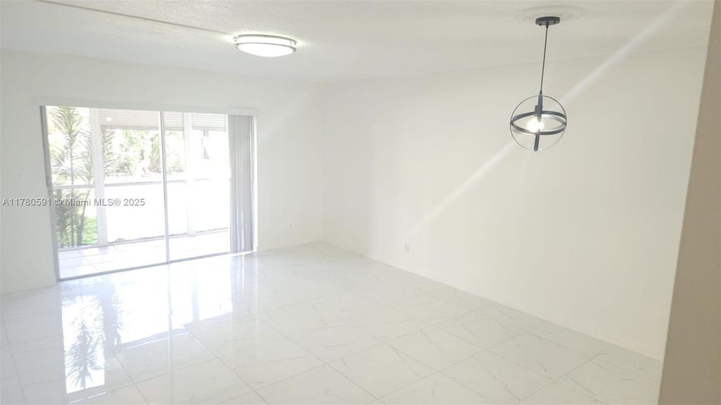 Photo of 218 NE 12th Ave #107, Hallandale Beach, FL 33009 (MLS # A11780591)