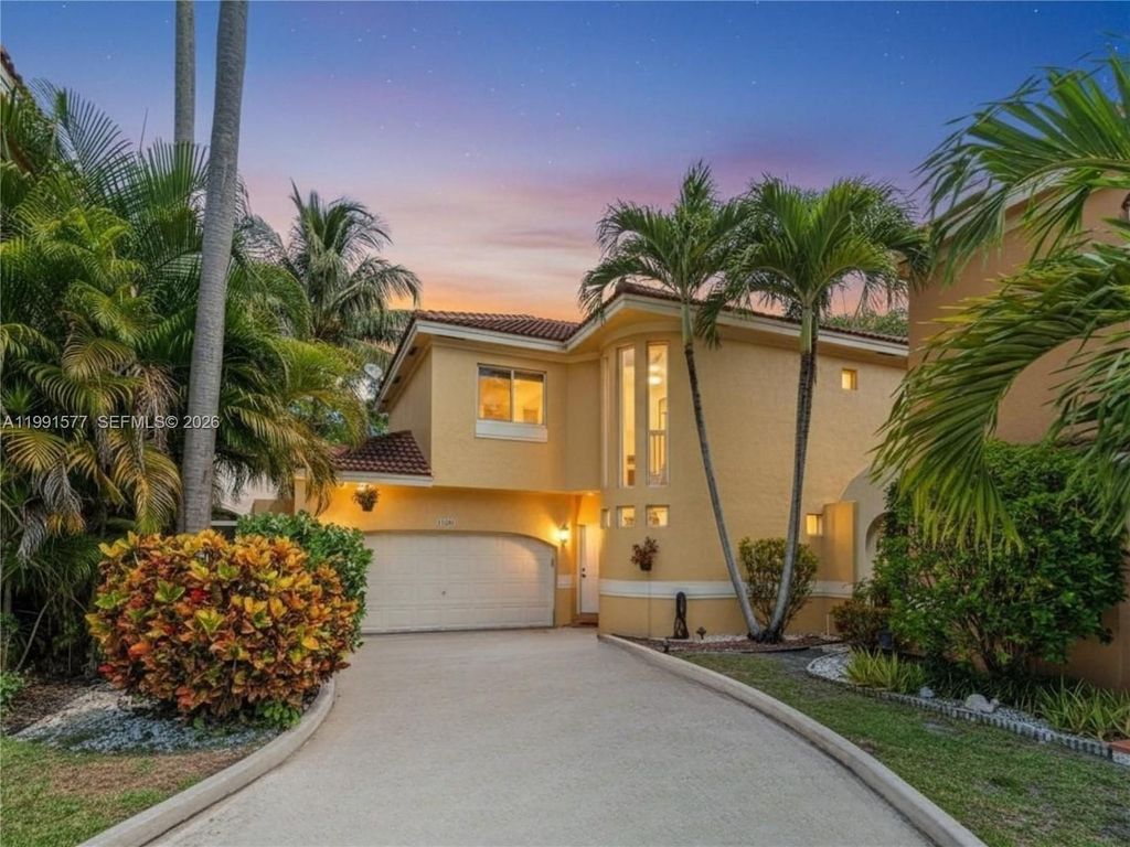 Photo of 11407 Lakeview Dr, Coral Springs, FL 33071 (MLS # A11991577)