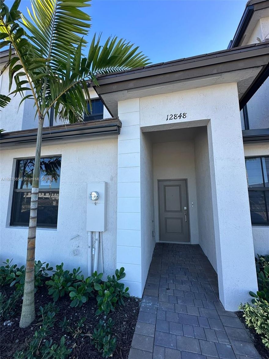 Modern 2024 townhouse in gated Siena Reserve featuring 3 bedrooms and 3 full baths, including a convenient first-floor bedroom perfect for guests or anyone who prefers no stairs. Open kitchen with stainless steel appliances, washer and dryer, and a private backyard ideal for grilling or outdoor relaxing. Enjoy clubhouse access, pool, playground, and private security in a growing community with easy access to main roads and daily essentials.