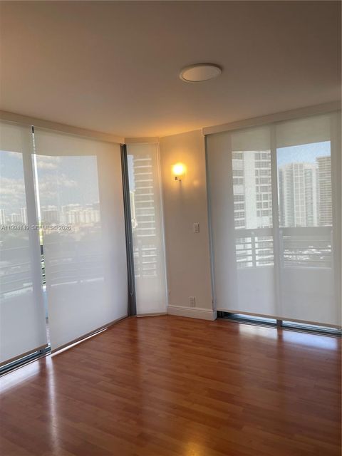 Photo of 3530 Mystic Pointe Dr #1509, Aventura, FL 33180 (MLS # A11994149)