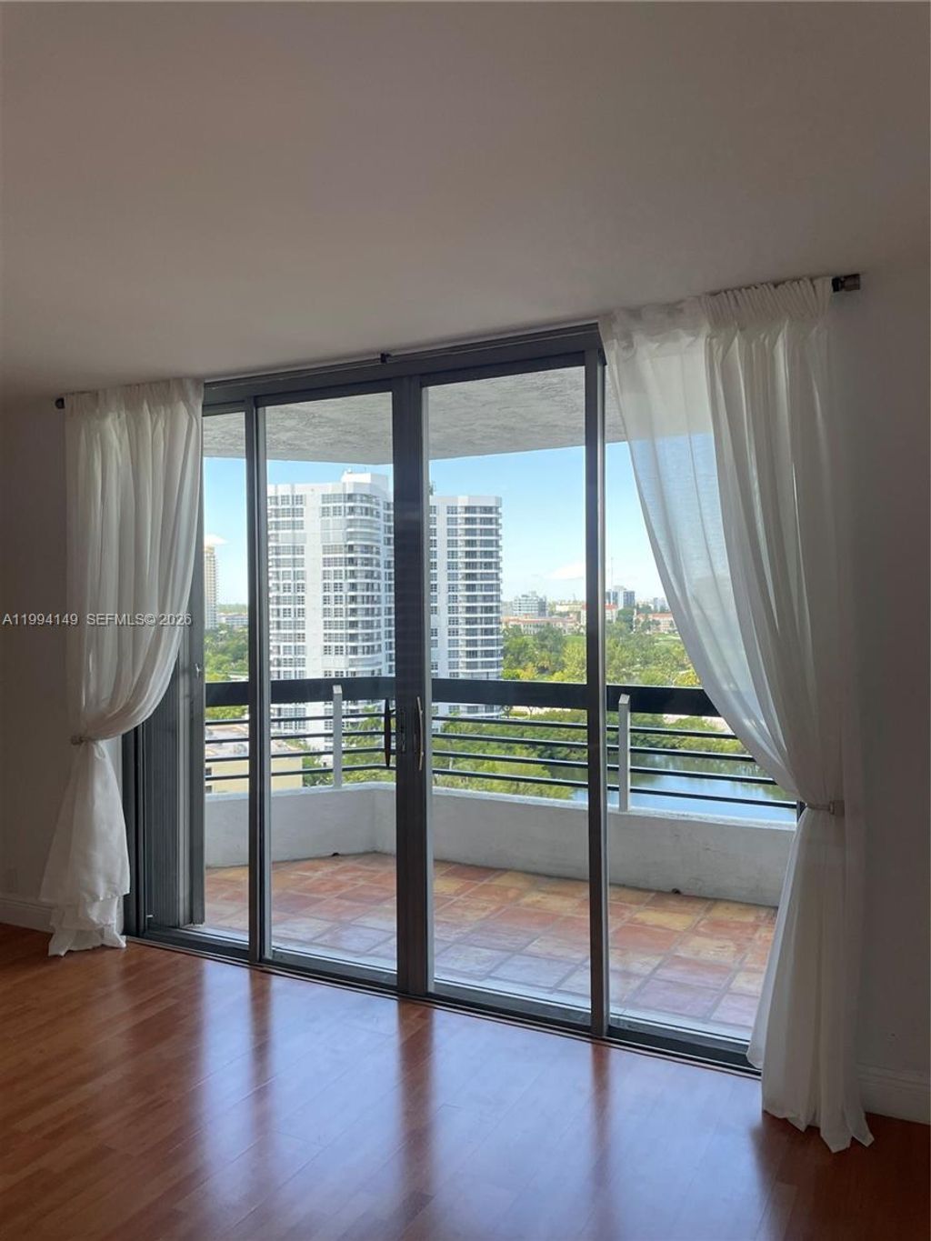 Photo of 3530 Mystic Pointe Dr #1509, Aventura, FL 33180 (MLS # A11994149)