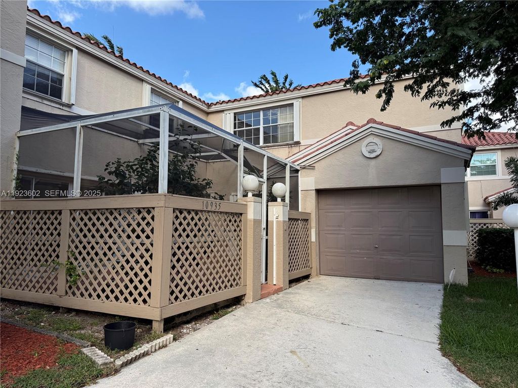 Photo of 10935 Neptune Dr, Cooper City, FL 33026 (MLS # A11923602)