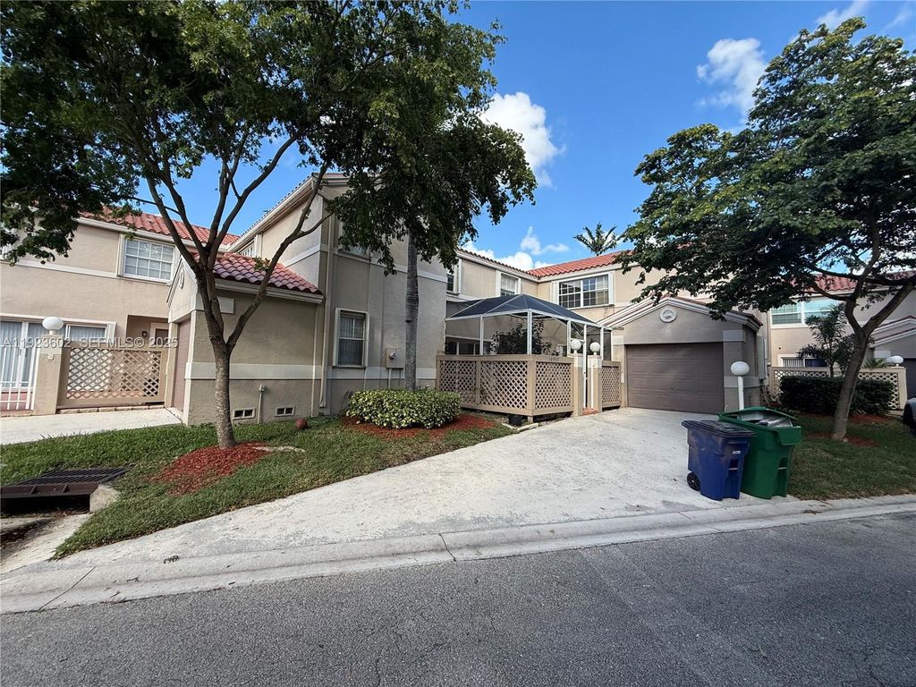 Photo of 10935 Neptune Dr, Cooper City, FL 33026 (MLS # A11923602)