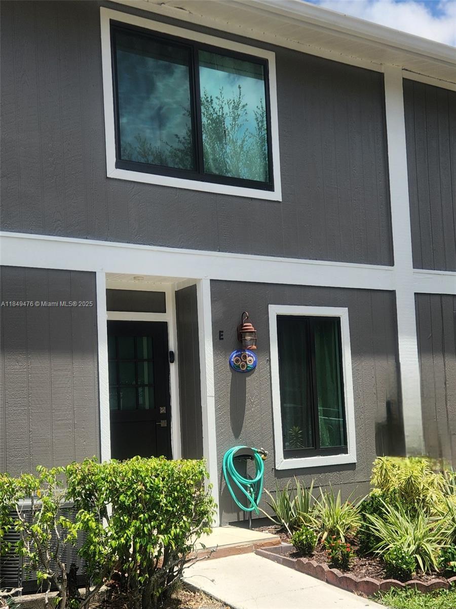 This property is a two-bedroom townhouse with two full bathrooms in each room and a half bathroom on the ground floor.The property features impact-resistant windows and doors throughout the house, spacious patios with fruit trees, a convenient location near the Turnpike and I-95 highways, and proximity to Palm Beach Airport. The property is in a family-friendly neighborhood and includes two parking spaces. The seller is willing to cover the buyer's closing costs. Call the listing agent for more information at .