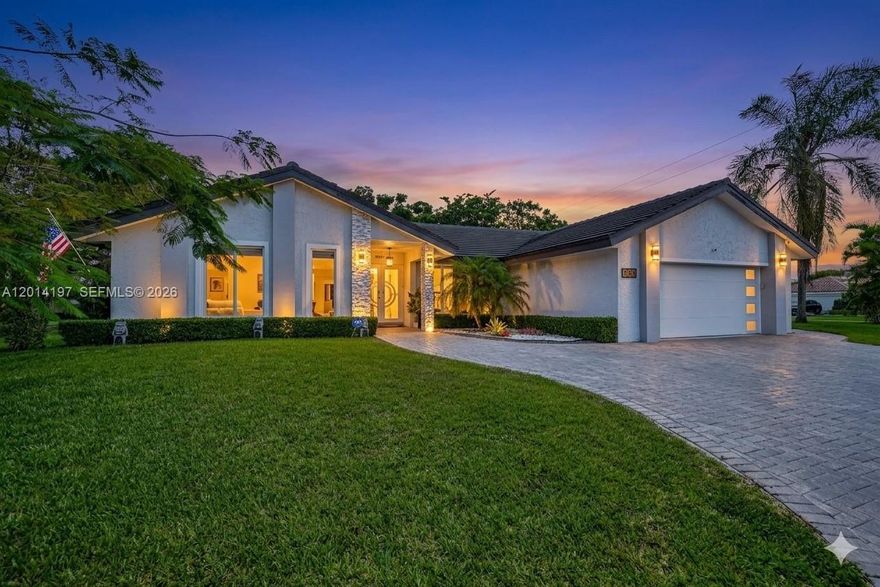 Exceptional residence in Deer Creek Golf Estates offering upscale South Florida living WITHOUT MANDATORY MEMBERSHIP FEES!. Experience the sophistication and convenience often found in Boca Raton while enjoying greater value in a premier Deerfield Beach location.
Striking entrance welcomes you to stunning water and pool vistas paired with high-end finishes and thoughtful upgrades throughout. Features include hurricane-impact glass, premium interior doors, customized storage solutions, elegant lighting, and refined designer details.
The gourmet European-style kitchen is equipped with Bosch appliances, Bertazzoni refrigerator, sleek porcelain surfaces, and contemporary cabinetry designed for both beauty and functionality. Luxurious baths showcase imported fixtures, custom tile accents, modern vanities, and advanced smart toilet technology.
Best value in the community!
Outdoor living shines with a spacious lakefront setting, inviting pool, and ideal entertaining areas. Additional improvements include a 2015 roof, updated A/C systems, EV charging outlet in garage, and ultra-low HOA dues of just $350 annually. Conveniently located near beaches, dining, shopping, and major roadways.