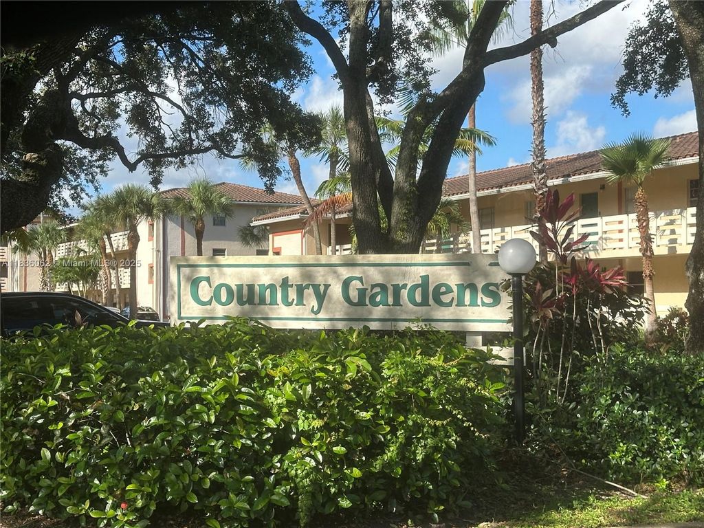 Photo of 3210 NW 103rd Ter #106-B, Coral Springs, FL 33065 (MLS # A11836062)