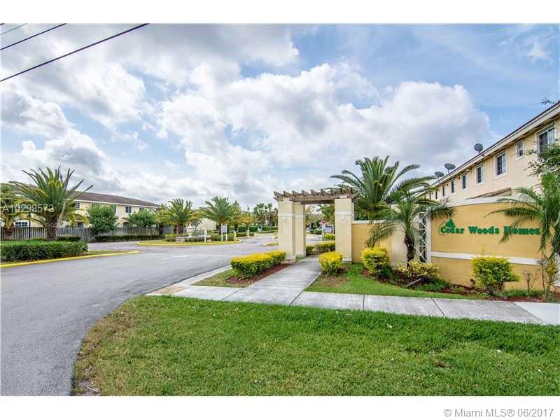 Spacious and Bright Townhouse 3 bedroom/2.5 bath. Open kitchen, tiled living areas, wood on stairs. 1 car garage, brick driveway. Great for entertaining and family gatherings. READY TO MOVE IN.