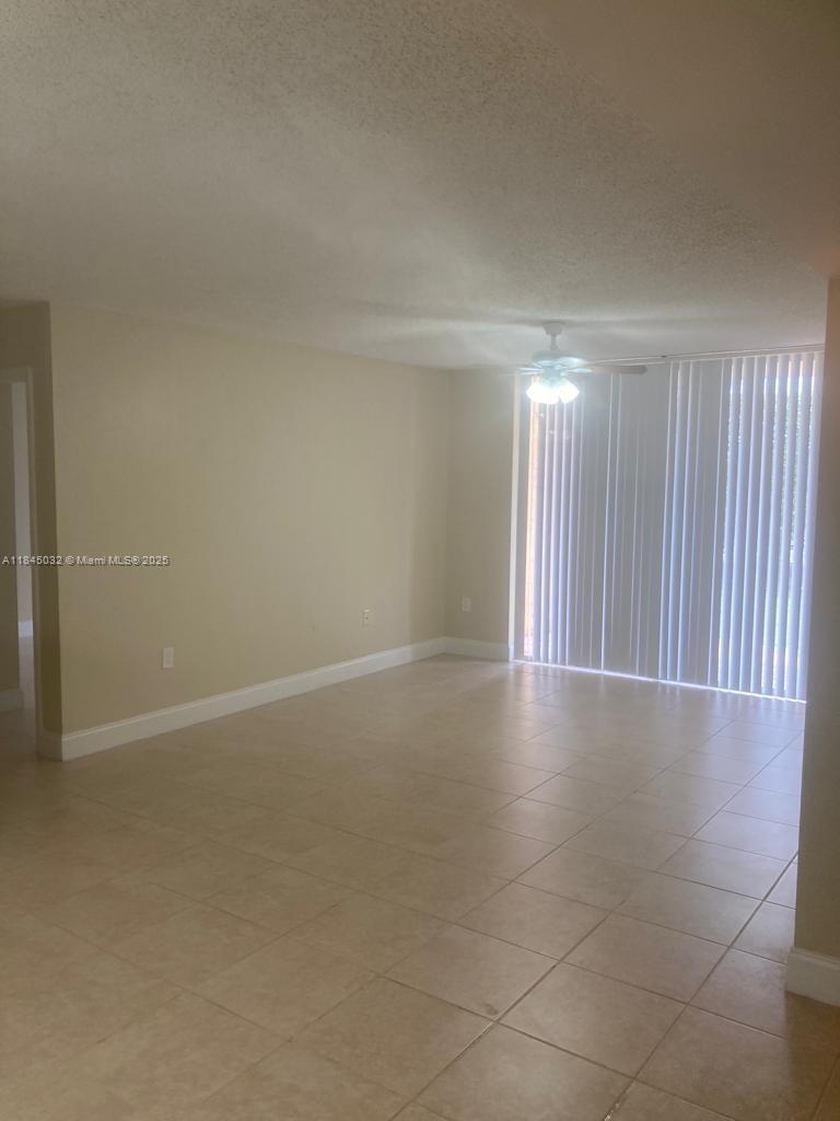 Nice 2 bedrooms, 2 baths on first floor, tiled throughout, granite countertops with nice backsplash, stainless steel appliances, washer & dryer inside, one assigned parking space.