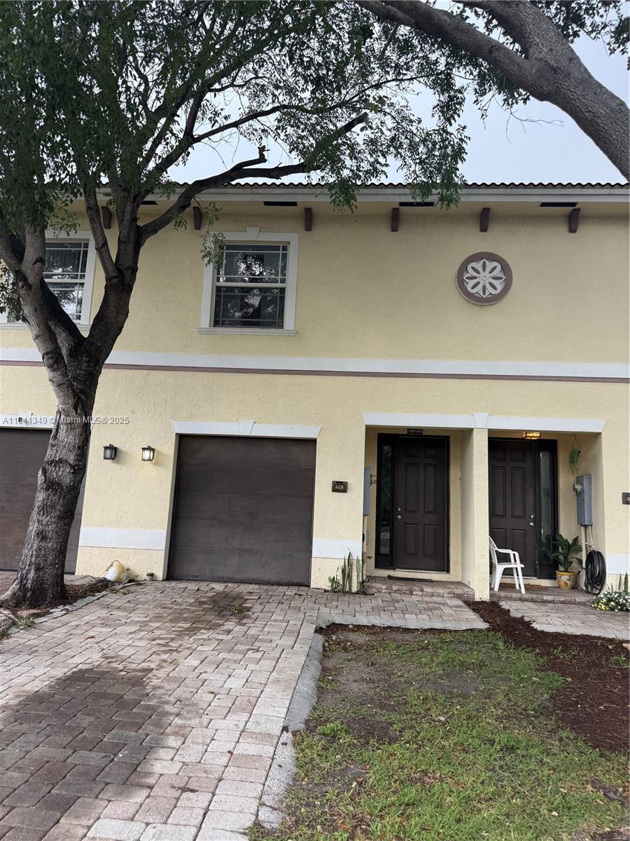 Beautifully updated 3-bedroom, 2.1-bath townhome featuring a modern kitchen. Enjoy soaring high-volume ceilings that fill the home with natural light. Includes a 1-car garage for added convenience. The property offers access to a nearly private community pool shared by only four homes, perfect for quiet relaxation. A rare opportunity to own a stylish, move-in-ready home with premium finishes and boutique amenities!
