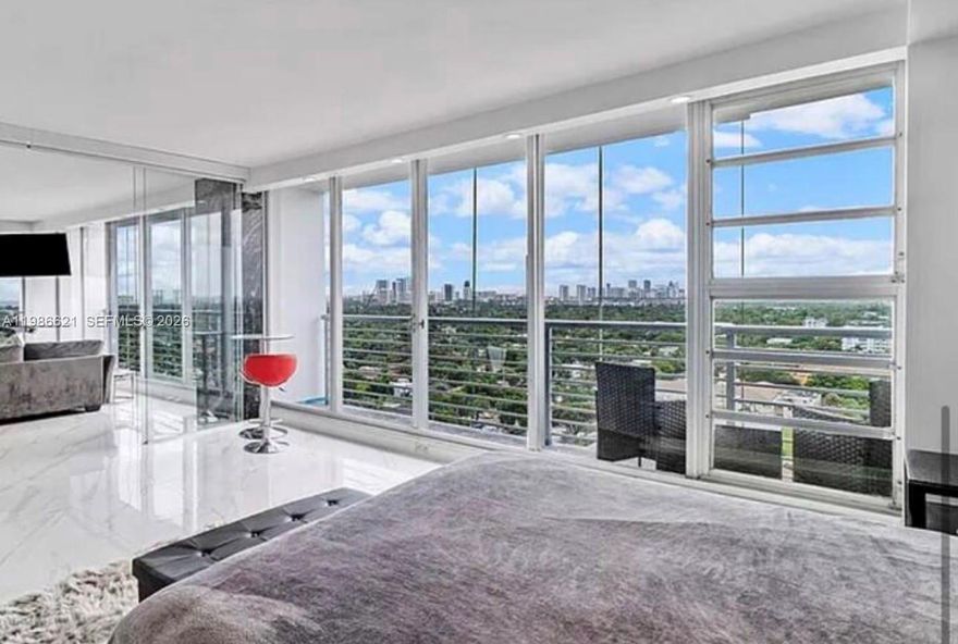 High-floor 1BR/2BA in the heart of Hollywood Circle with stunning city and distant ocean views. Floor-to-ceiling impact-proof windows fill the space with natural light, while multiple private balconies create seamless indoor-outdoor living. Open layout with updated kitchen, modern finishes, and spacious living/dining areas.

Primary suite features a private bath; second full bathroom adds flexibility for guests use. Ideal for end-users or investors with strong rental potential.

Prime location just steps to dining, shopping, parks, and nightlife, and minutes to the beach and Fort Lauderdale-Hollywood International Airport.