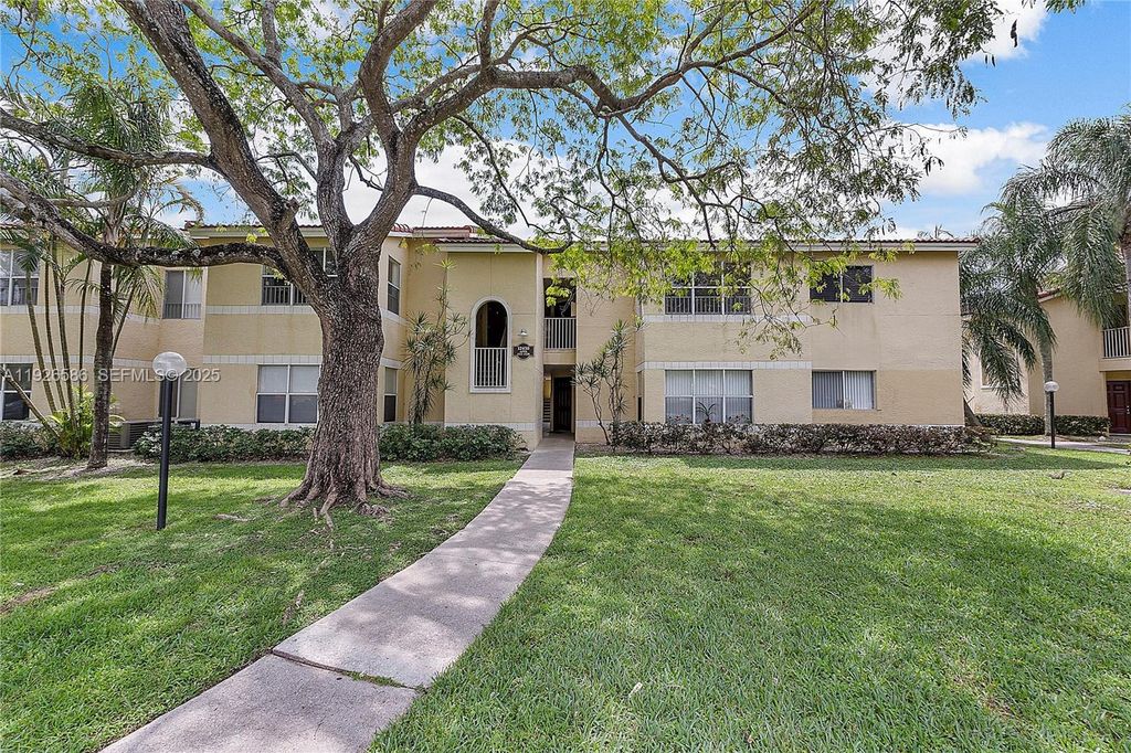 Photo of 12430 Vista Isles Dr #1327, Sunrise, FL 33325 (MLS # A11926586)