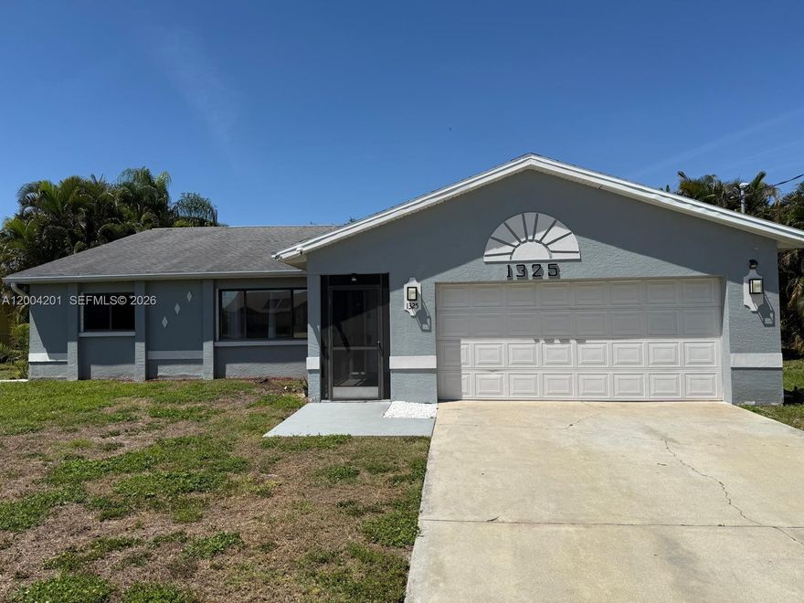 This beautiful and cozy home is located in one of Cape Coral's most desirable areas. Enjoy a quiet residential neighborhood while remaining close to shops and restaurants. The property stands out for its open-concept layout, spacious living areas, and nice natural light. The kitchen and bathrooms have been remodeled. Pool maintenance and lawn care are included. The property features a serene backyard complete with a screened-in pool and an outdoor kitchen, making it the perfect place to call home.