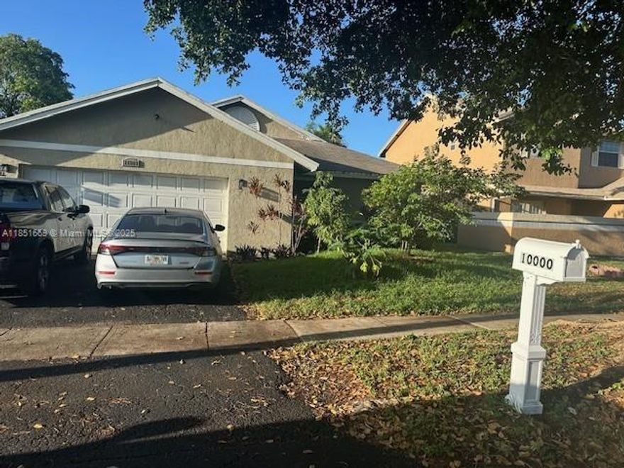 This beautiful 3 bedroom 2 bath home, with a pool and on the lake.   A PRIVATE FENCED IN BACKYARD AND OVERSIZED PATIO COMPLETE THIS BEAUTY. GREAT CENTRALLY LOCATED PEMBROKE PINES LOCATION.  CLOSE TO MANY GREAT SHOPS AND RESTAURANTS. TO TOP IT ALL OFF, SUPER LOW HOA DUES. COME GRAB THIS ONE BEFORE IT'S SOLD!