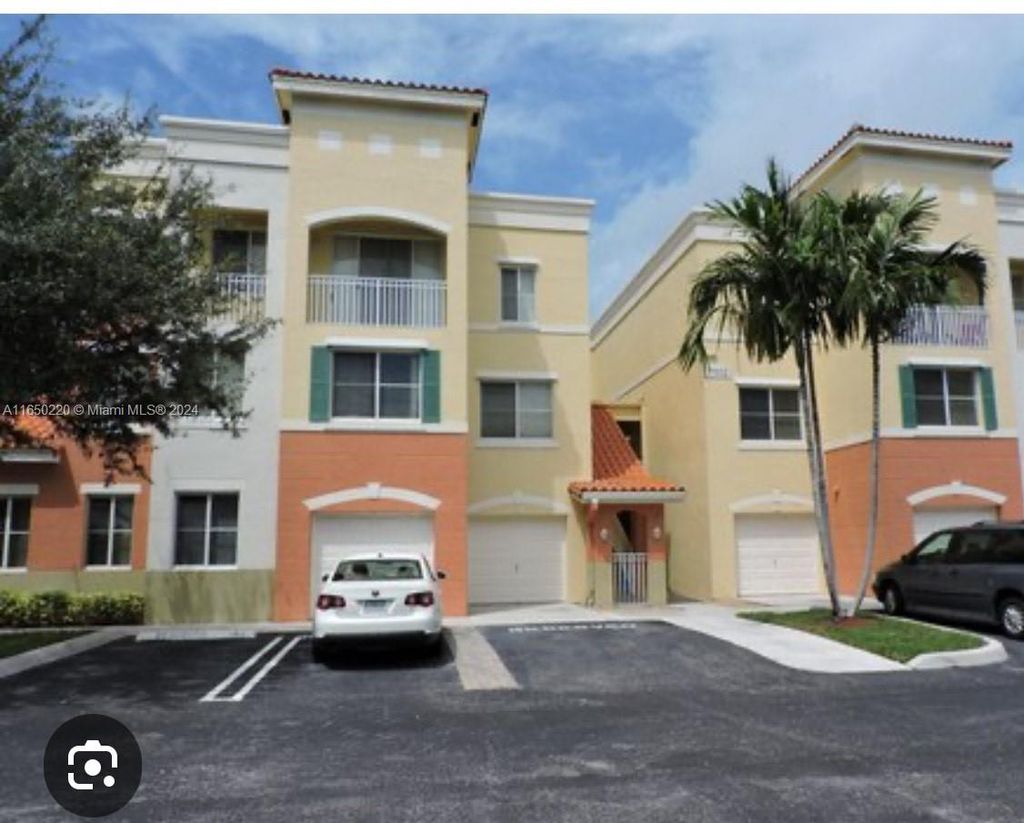 Photo of 11012 Legacy Dr #304, Palm Beach Gardens, FL 33410 (MLS # A11650220)