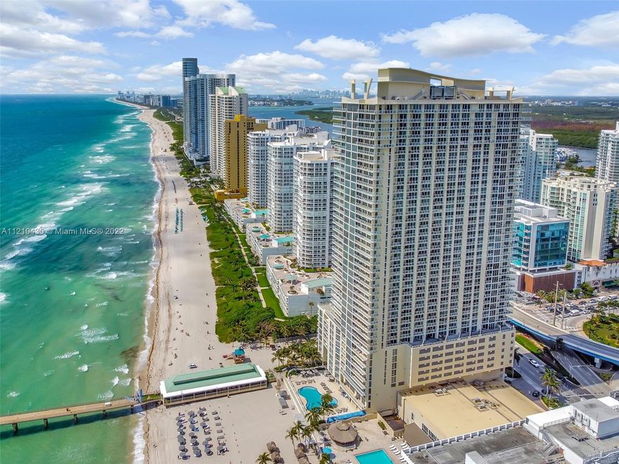 PARADISE IN SUNNY ISLES BEACH!! SPECTACULAR OCEAN-FRONT RESIDENCE ON THE 36TH FLOOR AT LA PERLA!!! 2 BEDROOMS PLUS A DEN WITH AMAZING OCEAN AND CITY VIEWS FROM ANY OF ITS 3 PRIVATE BALCONIES. UPGRADED MODERN PROPERTY: STAINLESS STEEL APPLIANCES AND TILED WALLS, NEW DECORATOR DOORS, WHITE MARBLE GLASS FLOORING THROUGHOUT MAIN LIVING AREAS AND BEDROOMS. UPGRADED BATHROOMS AND HIGH-IMPACT WINDOWS. LA PERLA ALLOWS SHORT-TERM RENTAL UP TO 12 TIMES/YEAR. THE BUILDING IS CONVENIENTLY LOCATED IN THE HEART OF SUNNY ISLES BEACH RESIDENTS CAN WALK TO SHOPPING, RESTAURANTS, ETC. THE BUILDING OFFERS FULL-SERVICE AMENITIES SUCH AS BEACH SERVICE, HEATED POOL, GYM, JACUZZI, KIDS ROOM, VALET SERVICES, ETC. THIS UNIT OFFERS AN EXTRA BONUS: 2 DEVELOPER-ASSIGNED SELF-PARKING SPACES RIGHT OFF THE ELEVATOR.