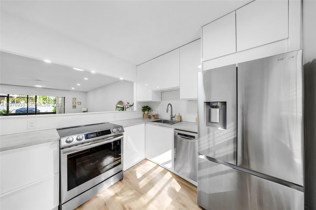 Photo of 130 S Cypress Rd #612, Pompano Beach, FL 33060 (MLS # A11976933)