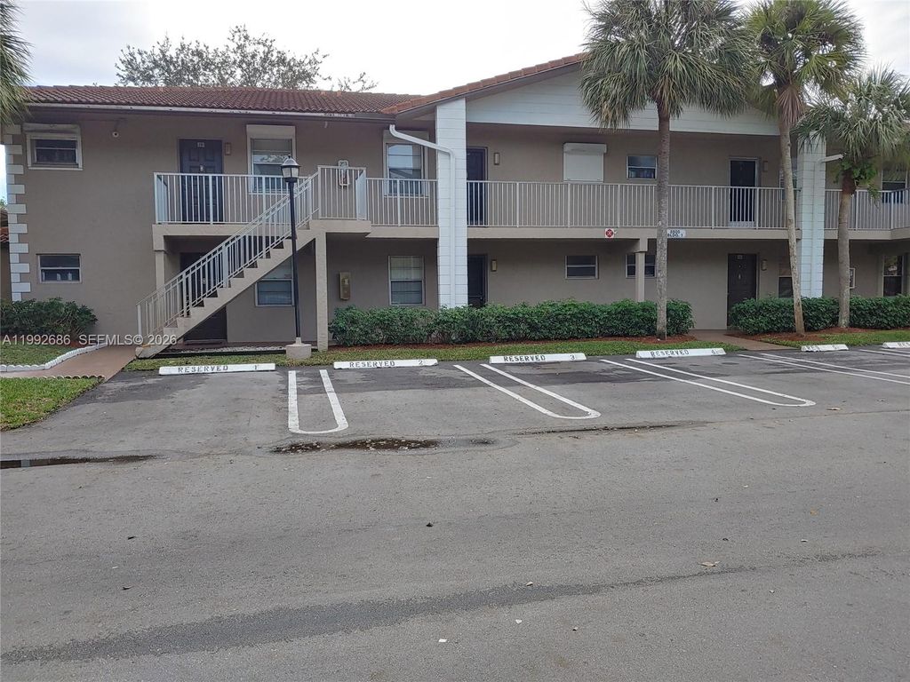 Photo of 8800 Royal Palm Blvd #102-1, Coral Springs, FL 33065 (MLS # A11992686)