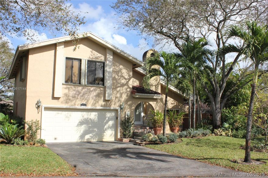 Beautiful 2 story home on a quiet cul-de-sac in the Cooper City neighborhood of Rock Creek.  Best deal in the area for a 4/3!  Appraised at $435,000 last year before upgrades!  A-Rated Cooper City schools.  Formal dining and living with a real working fireplace. One bedroom and full bathroom downstairs.  Large loft area upstairs perfect for an office, playroom or family room.  Home includes walk-in closets, new LED lighting throughout, fresh paint, new washer and dryer, spacious 2 car garage, large screened patio and no rear neighbors!  The home is located near a community playground.