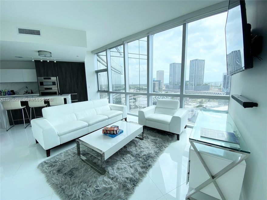 Welcome to one of the most prestigious buildings in Downtown Miami, where luxury meets modernity. This ultra-modern building is the epitome of style and luxury, offering its residents a high level of comfort and pleasure. There is a spacious swimming pool on the roof of this building, which offers breathtaking views of the city and the ocean. It is an ideal place to relax and unwind after a busy day, or to meet friends or family. Located in the heart of Downtown Miami, this building offers convenient access to everything this culturally diverse area has to offer. With its amazing location and high level of amenities, this building is one of the best places to stay in Miami.