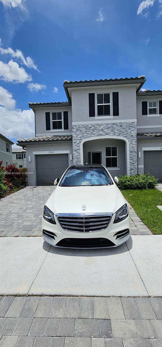 Modern 2023-built townhome for rent in Coral Springs! This is the Rose model—the largest floor plan in the community—offering 3 bedrooms, 3 full bathrooms, and a 1-car garage. Owner opted for the larger open living space instead of a 4th bedroom downstairs, but it can easily be converted into a 4th bedroom by adding a door, as it already has a full bath and closet on the main level. 1,974 sq ft under A/C and 2,252 total sq ft. Contemporary design, open layout, and prime location make this home a standout!