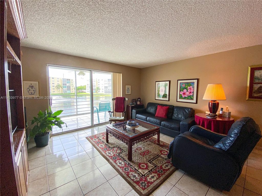 Photo of 401 SE 3rd St #201, Dania Beach, FL 33004 (MLS # A11433977)