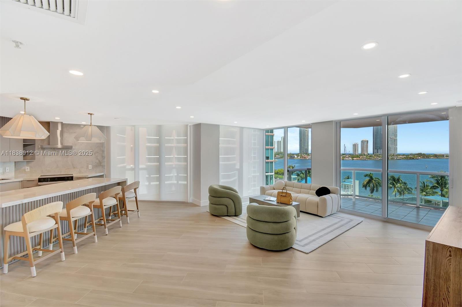 WOW! NEW NEW NEW! THIS 100% RENOVATED SPECTACULAR MODERN GEM WAS JUST COMPLETED W/NO EXPENSE SPARED AND THE ONE YOU'VE BEEN WAITING FOR! ENTER FROM SEMI-PRIVATE ELEVATOR FOYER & IMMEDIATELY & THROUGHOUT SEE THE BEST OCEAN, INTRACOASTAL, & CITY VIEWS FROM FLOOR TO CEILING GLASS WINDOWS & 3 TERRACES. OPEN STATE OF THE ART BRAND NEW CONTEMPORARY CHEF'S KITCHEN, TOP OF THE LINE APPLIANCES. ALL NEW STUNNING BATHROOMS. THE FINEST FINISHES. 2 BEDROOM ENSUITES + HALF BATH. SEPARATE LARGE UTILITY ROOM + MORE! A PERFECT 10!
5 Star amenities include: 2 story spa, pools, tennis courts, gym, private 65' marina, private park, valet-security, 3 covered parking spaces, & much more.