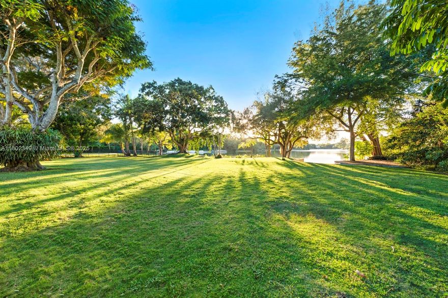 Seize the rare opportunity to craft your lakefront sanctuary in prestigious, gated Hammock Lakes. Nestled on a lush acre, this prime lot and residence promise breathtaking sunset vistas. Expand and enhance the existing Mid Century single-story home, distinguished by high ceilings in open, glass walled living spaces, or envision and build your own masterpiece from the ground up. Situated in one of Coral Gables’ most desirable neighborhoods, this property delivers unmatched potential to transform your dreams into reality. Experience the tranquility and remarkable appeal of this sought-after lakeside location. Rent or occupy home during design and planning process. Property is in a Miami-Dade Special Taxing District.