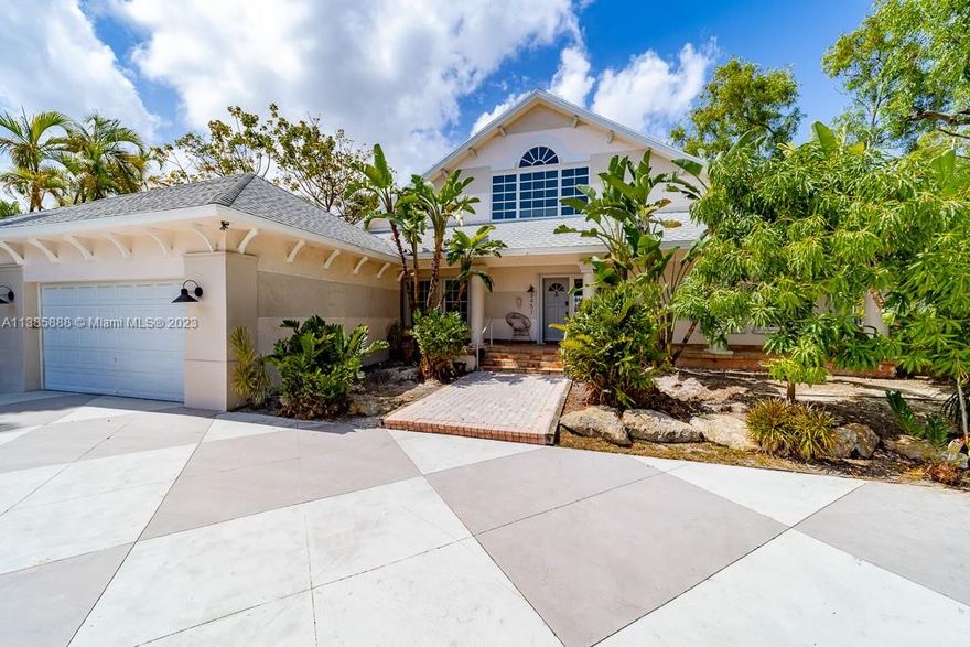 Exceptional 2 story waterfront home on an oversized lot and private dock. Located in the guard-gated community of Eastern Shores. Offering unique luxe living & incredible indoor/outdoor space for entertaining. Beautiful entry foyer leads to formal living room, formal dining room and chef's gourmet custom kitchen w/ exotic countertop and custom cabinetry. Featuring 4 bedrooms w/ spacious master suite w/direct canal and garden views, 4 bathrooms, family/media room w/ mini-bar, terrace, 2 car garage, lush garden, w/ Jacuzzi & lounge area. Close to Sunny Isles Beach, Aventura, Bal Harbor, Oleta Park, shopping and dining. *** No fixed bridges to ocean access at Haulover Inlet!***