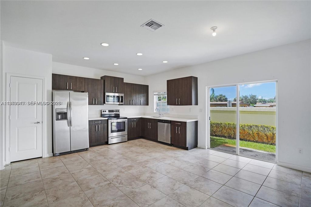 Photo of 1121 NW 41st Ln, Lauderhill, FL 33313 (MLS # A11979317)