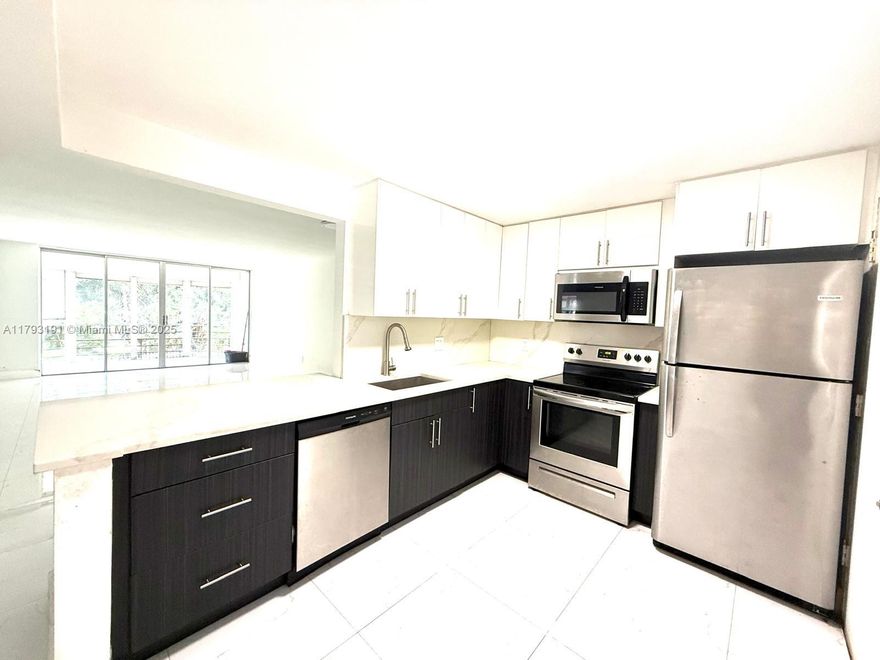 Feel the peace and natural light as you enter this bright apartment with soft white tones. It features a large master bedroom, spacious second bedroom, and two modern bathrooms—one with a tub and one with a shower. The modern custom-made open kitchen offers stone countertops, stainless steel appliances, and plenty of storage. Enjoy a private balcony and hurricane shutters on all windows and doors. Conveniently located near Aventura Mall, beaches, I-95, and top-rated schools. Schedule a showing today!