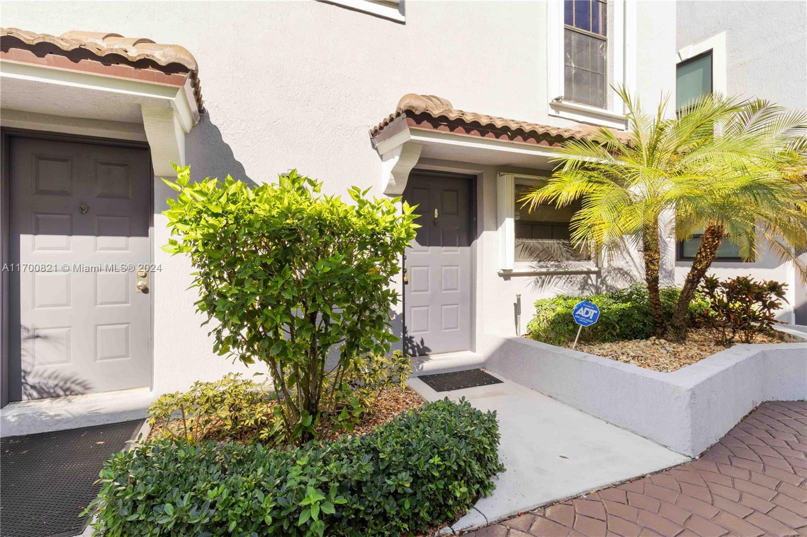 Welcome to this stunning corner unit townhouse, featuring 2 bedrooms and 2.1 bathrooms. The open-concept design highlights a sleek, modern kitchen that flows seamlessly into the living area, perfect for entertaining. Step outside to your private patio, ideal for relaxing or outdoor dining. This unit offers the added luxury of access to a beautiful community pool and is secured by a guard gate for peace of mind. Across from Pembroke Mall, Hospital & CB Smith Park. Experience comfortable and stylish living in this exceptionally roomy townhouse!