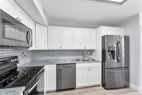 Photo of 7225 Promenade Dr #102, Boca Raton, FL 33433 (MLS # A11993586)