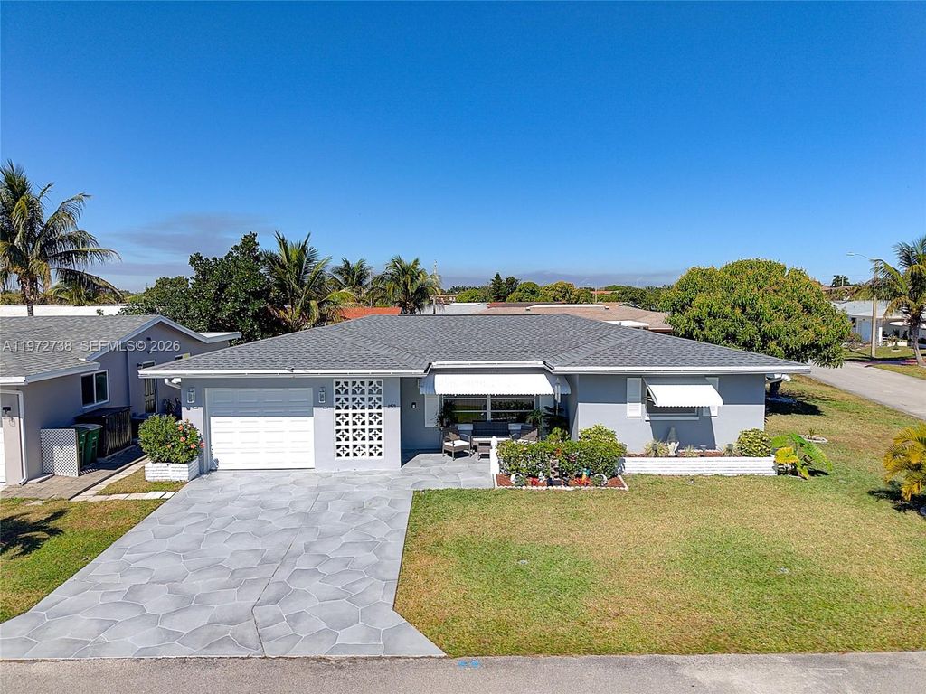 Photo of 5409 NW 49th Ave, Tamarac, FL 33319 (MLS # A11972738)