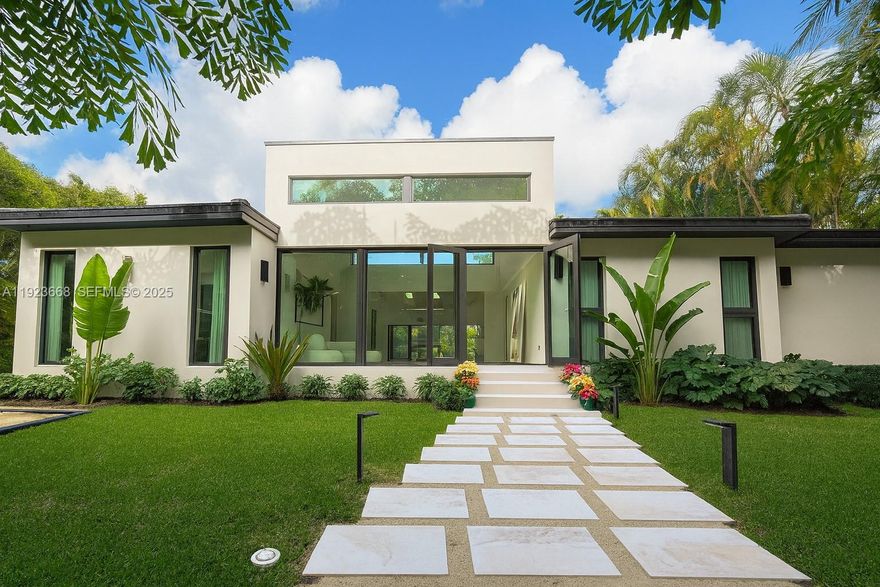 Offered AS IS, this exceptional 3,100 SF modern waterfront home on Belle Meade delivers luxury living with 113 FT of direct waterfront, no fixed bridges, and fast access to Biscayne Bay. Fully redesigned on a rare 16,800 SF double lot, this Miami waterfront property offers high ceilings, expansive indoor–outdoor living, and a resort-style setting in a private, guard-gated community.
The home features a complete luxury renovation, including a gourmet Miele chef’s kitchen, custom millwork, premium finishes, Lutron HomeWorks smart lighting, whole-home audio, UniFi networking, and motorized window treatments. The 750 SF primary suite includes a spa bath with steam showers, soaking tub, designer stone, and a 225 SF boutique dressing room with custom cabinetry and island.
Perfect for boaters, the property offers direct bay access, shore power at the seawall, and a massive waterfront yard ideal for entertaining. The oversized lot includes a bocce court, lush landscaping, and space for a future pool or expansion.
Located minutes from the Miami Design District, Midtown, Wynwood, Miami Beach, top restaurants, marinas, and elite private schools including The Cushman School and Miami Country Day School. A rare opportunity to own a move-in-ready luxury waterfront home in one of Miami’s most desirable gated island communities—presented AS IS and priced for exceptional value. For all showing request, kindly tex only at  305-4968405