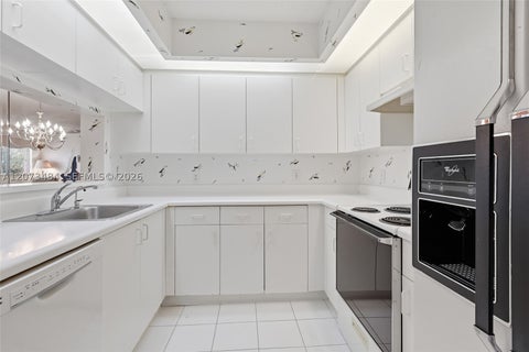 Photo of 13701 SW 12th St #311A, Pembroke Pines, FL 33027 (MLS # A12073484)