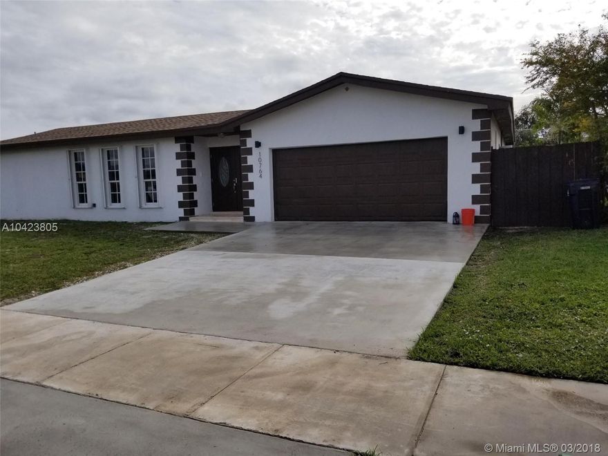 Beautifully remodeled single family residence with a large lot. The property features 4/2 2 car garage with new kitchen, new marble bathrooms, new laminated floors, new stainless steel appliances, new granite counter tops and a new roof. Hurry it won't last !