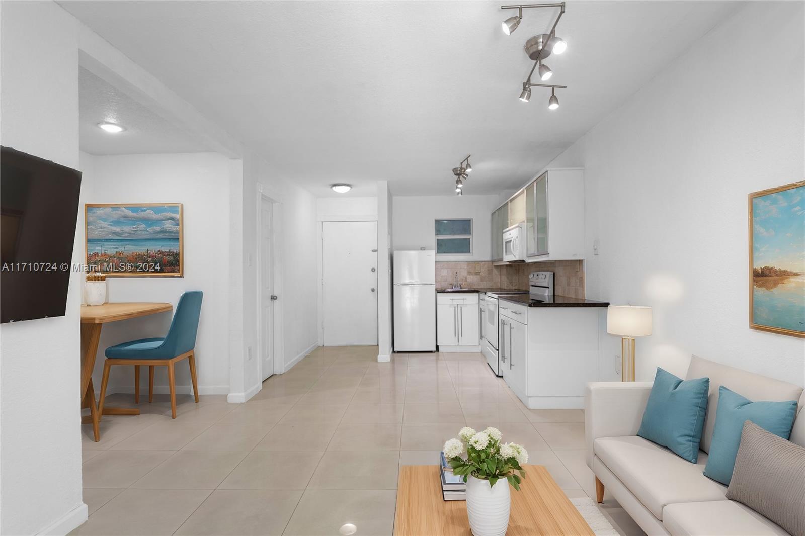 Charming 1-Bedroom Apartment in Miami Beach!
Enjoy coastal living with stunning water views, just 5 minutes from the beach. Located in Upper North Miami Beach, this updated unit features a sleek white kitchen and bathroom, a privacy wall with a sliding door, and impact glass for added safety. Relax on the balcony overlooking the water. The building offers great amenities, including a pool, BBQ area, gated entrance, and laundry on the same floor. Walk to shops, restaurants, and the beach. Vacant and ready for immediate occupancy—an excellent investment opportunity. Don’t miss your chance to own a slice of paradise!