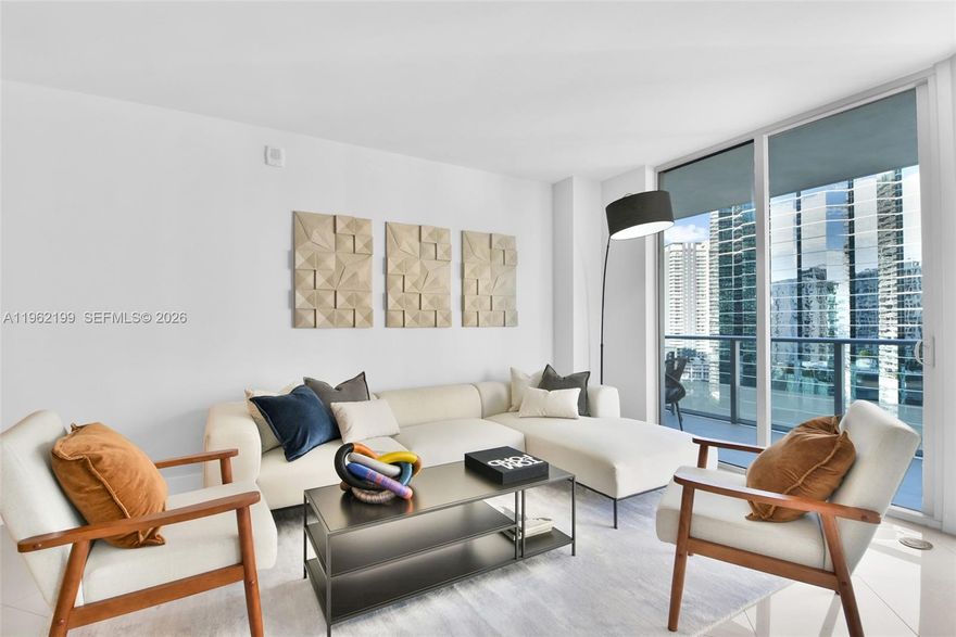 A fantastic  two-bedroom, two-bath corner residence located in the highly coveted Brickell House. Perfectly positioned by the Biscayne Bay, this apartment offers the rare combination of tranquil waterfront living just steps from the vibrant energy of Brickell and Downtown Miami. The residence features elegant wood-look tile flooring throughout, custom-built closets, blackout shades, and a beautifully appointed designer kitchen. A spacious wraparound balcony extends from the living area to the bedrooms, creating a seamless indoor-outdoor living experience. 
Brickell House offers a full suite of luxury amenities, including two resort-style pools, a hot tub, state-of-the-art fitness center with spa, private theater, multiple resident lounges, a children’s playroom, and 24-hour concierge, valet, and security services.