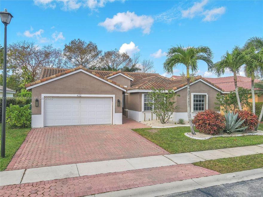 Discover this stunning 4-bedroom, 2-bathroom pool home in the exclusive gated community of Alhambra, featuring serene west-facing views of a private preserve. Freshly painted and boasting a series of recent upgrades, this home is move-in ready. Enjoy the durability and style of a concrete tile roof installed in 2018, elegant porcelain wood-like flooring, and new kitchen appliances. Additional upgrades include a new AC system, and hurricane impact garage door. This home is has hurricane impact accordion shutters, a brick paver driveway, and a split floor plan with an open concept that's perfect for entertaining. Additional features include a two-car garage, energy-efficient LED fixtures. Located in a community with top-rated schools and offering easy access to I-75 and US-27.