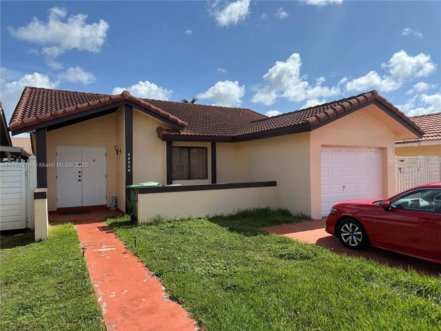 This Cozy 3/2 home is in the heart of West Kendall. Steps away from Islas canarias, Wendy’s, Los Verdes, Bravos, barber shops, salons, gas stations, supermarket plazas, and more. Roof replaced in 2018, AC replaced in 2019, Water Heater 2022 updated kitchen in 2016 with garage. The Garage has a window and ceiling fan, which makes it an easy conversion to an extra bedroom/Florida room or efficiency for additional income. This is your future family home. Only one original owner, who lived here for 30 years. Needs a new homeowner's touch!