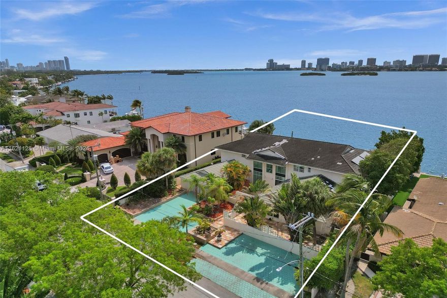 Located in the gated waterfront community of Keystone Island I, this oversized 15,393 SF lot boasts 103 FT of water frontage, with spectacular east facing wide bay views. Build your dream home ground up or renovate this spacious 7 bedroom 7 bathroom two story home, with an open floorplan, big bright rooms, and large pool home. Enjoy views of Biscayne Bay, Bay Harbor, Bal Harbor and the skyline. Imagine waking up to the breathtaking sunrises every morning from your residence. Located close to the Bay Harbour entrance, this property is a boater's dream with room for your yacht, deep water dockage and no fixed bridges.