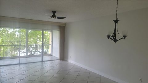 Photo of 6091 NW 61 Avenue #310, Tamarac, FL 33319 (MLS # A11780521)