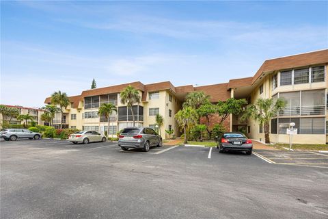 Photo of 3071 NW 47th Ter #323, Lauderdale Lakes, FL 33313 (MLS # A11952331)