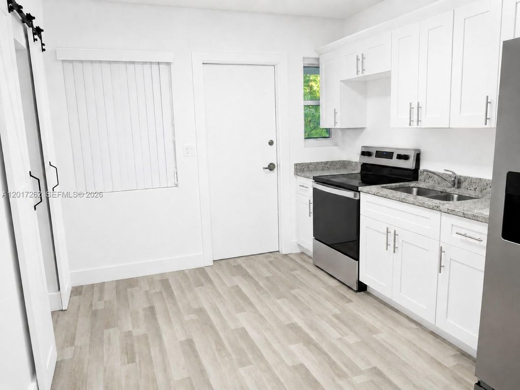 Photo of 831 El Prado, West Palm Beach, FL 33405 (MLS # A12017262)