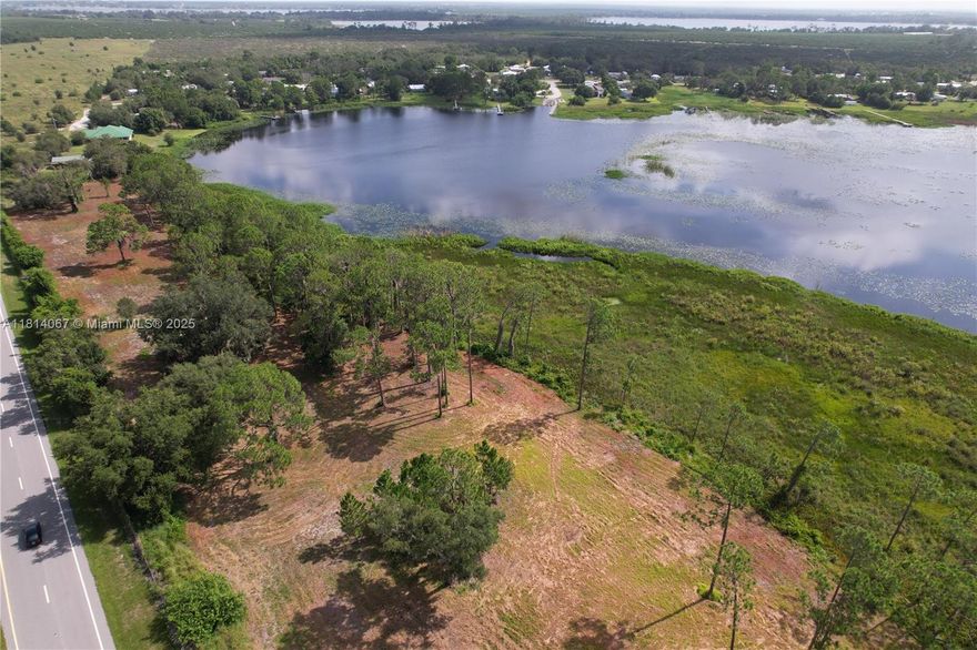 This is must see to appreciate property. This is gorgeous lot with 992 linear feet of lakefront. Recently Platted for a large single family home or family compound. Access to lot from both Holiday Beach Drive  and Panther Parkway. 

Just drive by on Panther Parkway and enjoy.